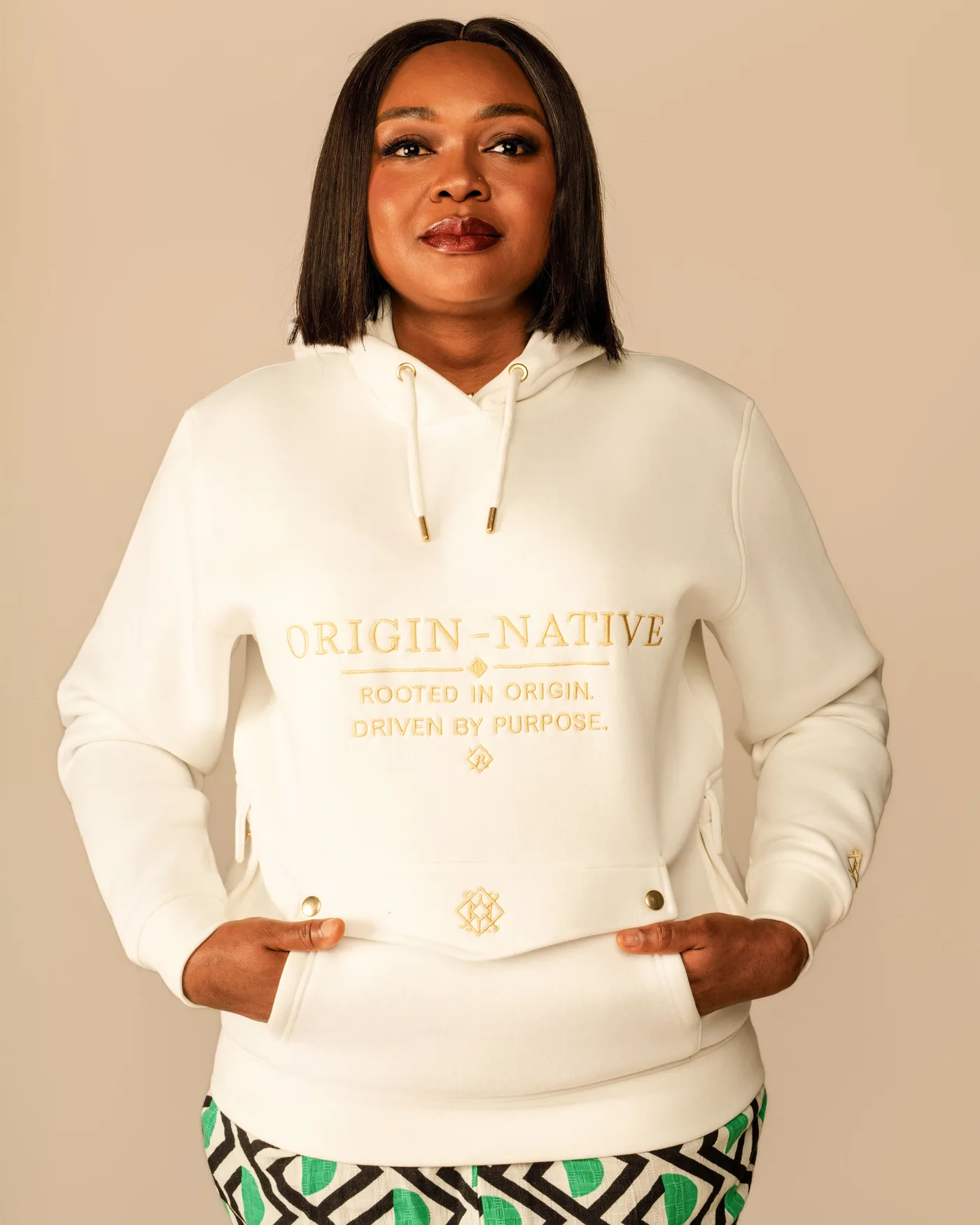 The Origin Hoodie in cream, whose pack carried ease instructions and whose sample fit perfectly